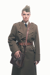 Wall Mural - Retro army uniform fashion woman isolated against white.