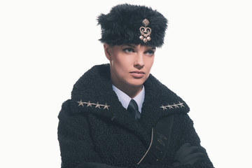 Wall Mural - Female guard wearing retro russian winter costume with hat isola