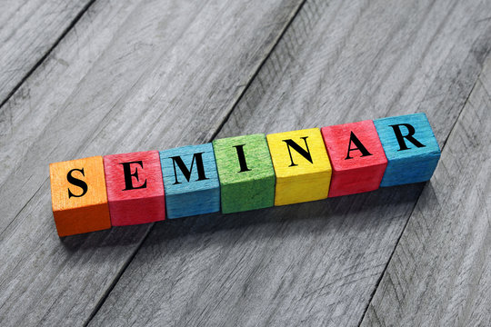 seminar text on colorful wooden cubes