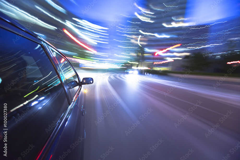 Night drive with car in motion. - obrazy, fototapety, plakaty 