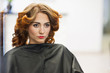© pabisiak - Red curly hair girl sitting at hairdresser