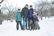 © Louis-Paul Photo - Happy parents and their kids in winterwear