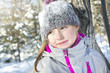© Louis-Paul Photo - Little girl in winter season with hat in snow.