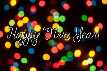 Wall Mural - Happy new year congratulation on festive bokeh background