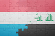 © luzitanija - puzzle with the national flag of luxembourg and iraq