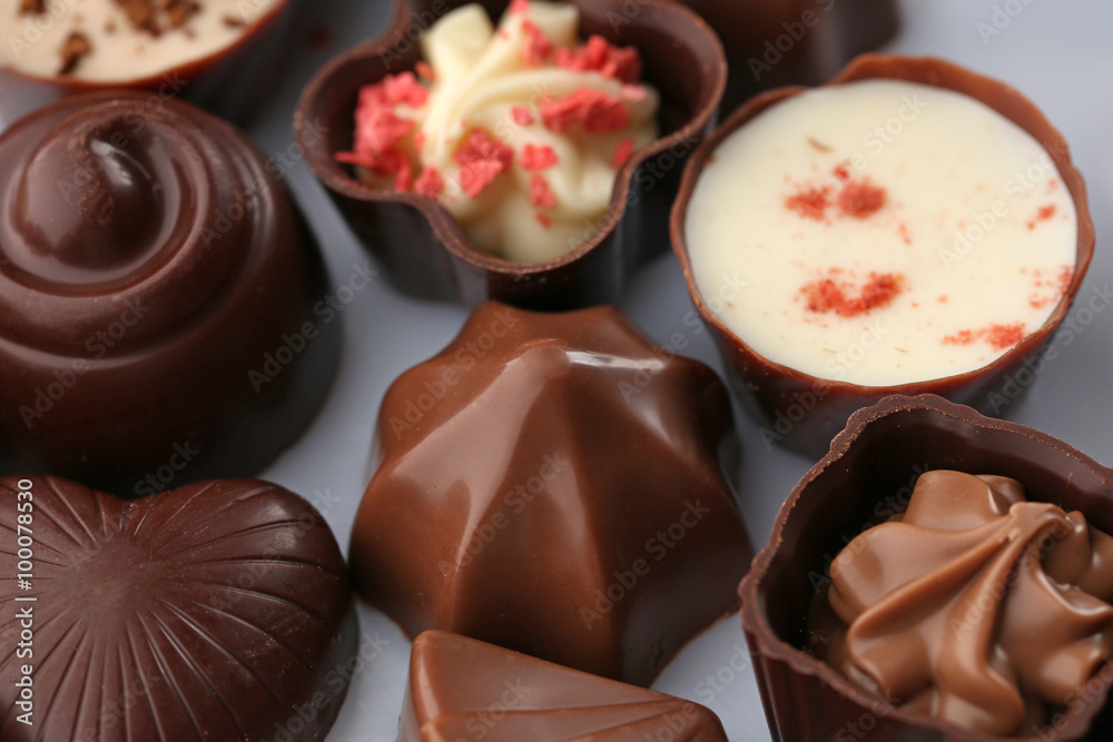 Assorted chocolate candies, close up