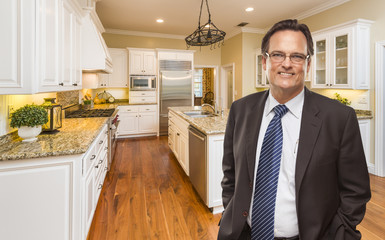 Wall Mural - Man Wearing Necktie in Beautiful Custom Residential Kitchen