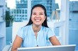 © WavebreakmediaMicro - Smiling businesswoman working at her desk