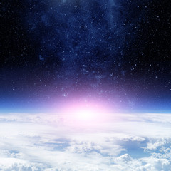 Wall Mural - clouds of earth planet and star sky on the background. elements of this image are furnished by nasa