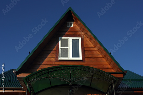 Green Metal Roof And White Attic Window Buy This Stock Photo And