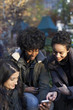 © HEX - Young women checking their smart phones