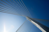 Fototapeta  - Wonderful white bridge structure over clear blue sky