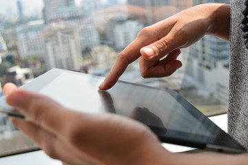 touching screen of a tablet computer