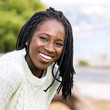 © karelnoppe - Cute african teen girl with long braided hairstyle.
