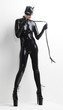 © Richard Semik - standing woman wearing latex clothes with a whip