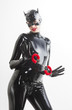 © Richard Semik - portrait of woman wearing latex clothes with handcuffs