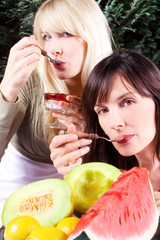 two women eating ice cream  