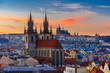 Aerial view over Church of Our Lady before Tyn, Old Town and Prague Castle at sunset in Prague, Czech Republic 