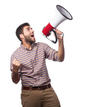 Portrait Of A Handsome Man Shouting With A Megaphone