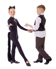 Wall Mural - Dancing little girl dressed as a cat and a boy in a plaid vest