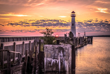 Lighthouse Sunrise. The Wawatam Lighthouse In St. Ignace, Michigan As Sun Rises Over Lake Huron.