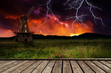 Wall Mural - Windmill in the thunderstorm.