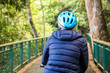 © twinsterphoto - Young man cycling in the forest trail in cold weather during weekend