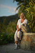© aletia2011 - elderly woman   in tropical garden