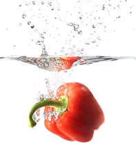 Red Pepper, Paprika In Water Splash