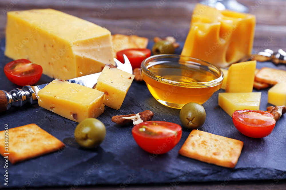 Cheese for tasting on a mat closeup