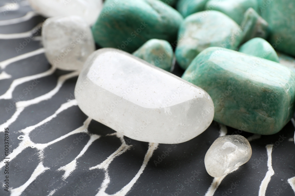 Beautiful mineral stones on dark surface