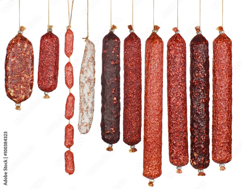 selection salami sausages isolated on white background - obrazy, fototapety, plakaty 