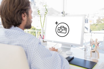 Poster - Composite image of desinger working on his computer