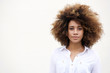 © mimagephotos - One african american woman with curly hair