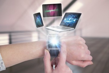 Poster - Composite image of woman using smartwatch