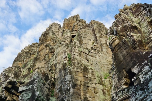 Fotografija  Ruins of the Bayon temple with its giant stone heads near Angkor, Cambodia