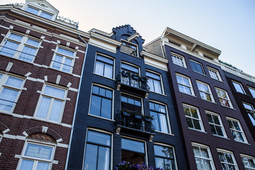 Wall Mural - City houses close-up. Amsterdam - Netherland.