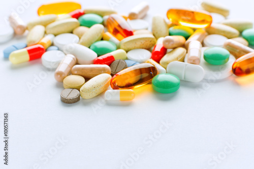 Fotografie, Obraz Vitamins, omega 3, cod-liver oil, dietary supplement and tablets an embankment o