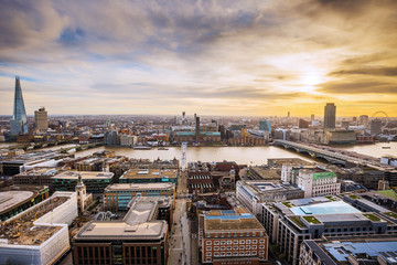 Wall Mural - Panoramic skyline view of south London from the top of St.Paul's Cathedral at sunset with blue sky and clouds and River Thames - London, UK