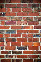 Red Brick Wall Background In Portrait View