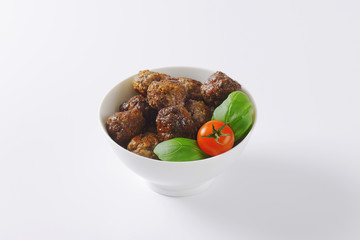 Canvas Print - bowl of pan fried meatballs