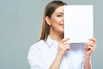 Canvas Print - Business woman hide face behind white sign board