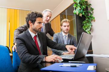 Wall Mural - Business people at work in their office