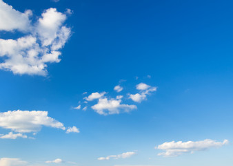 Wall Mural - white fluffy clouds in the blue sky
