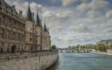 Fototapeta Paryż - Embankment of the Seine river in historical center of Paris, France