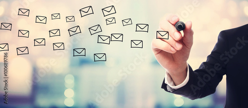 Cuadros en Lienzo Businessman drawing E-mails concept