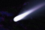 blue comet on the space with colorful nebula