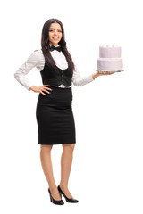 Canvas Print - Young waitress holding a cake