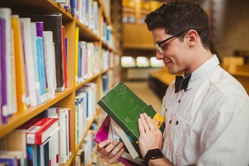 Poster - Portrait of nerd holding books