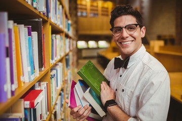 Poster - Portrait of nerd holding books